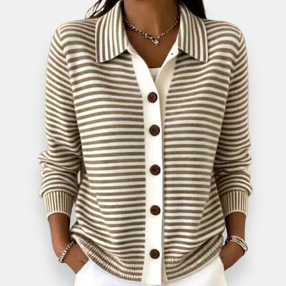Model wearing the collared cardigan in taupe and white stripes, with a white button placket, brown buttons and ribbed cuffs. 1