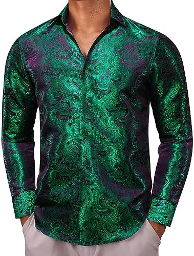 Shirt worn buttoned up by a model, in emerald green paisley jacquard with purple undertones and a glossy sheen. 12