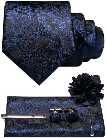 Navy blue paisley tie set laid out with pocket square, cufflinks, tie clip and flower brooch 23