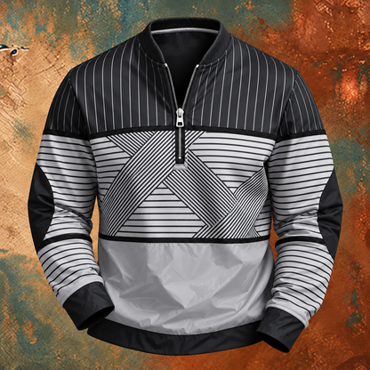 Black and white version of the striped half-zip jumper, front view on a textured rust backdrop 3