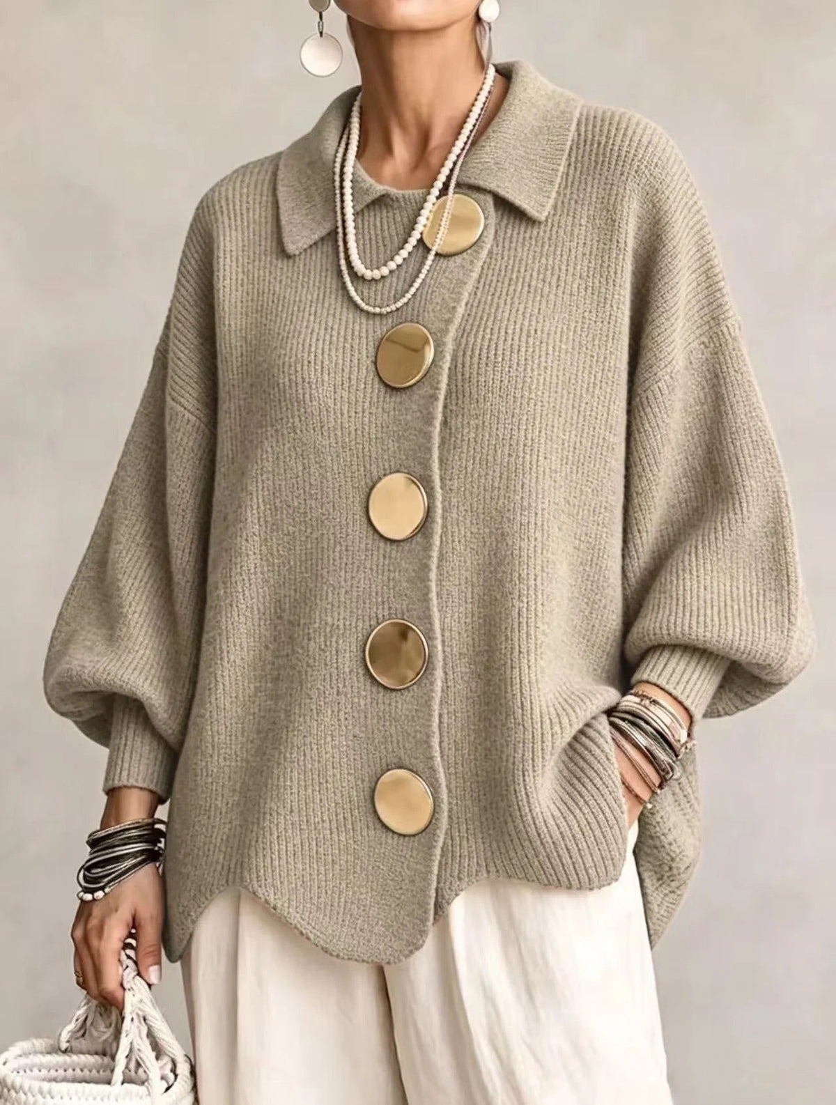 Sage khaki version worn with cream trousers, with large gold buttons and pearl necklaces 17