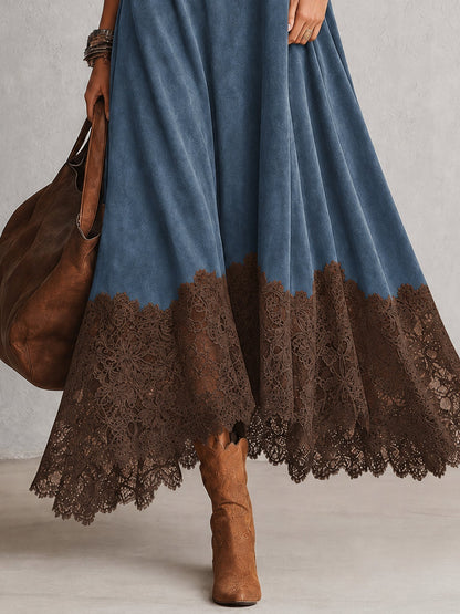 Close-up of the brown scalloped lace hem on the blue dress's flowing skirt 12