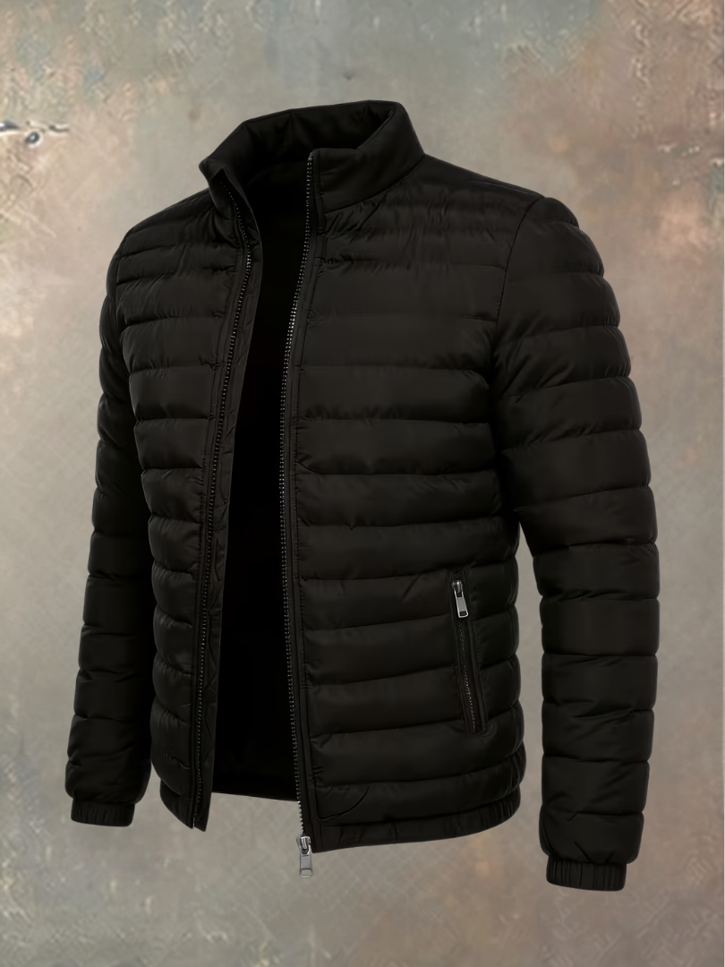 Quilted puffer jacket in black, angled view with stand-up collar, zipped pocket and elasticated cuffs 6