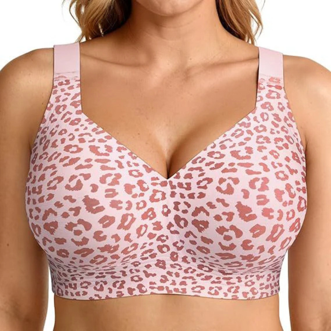 Front view of the bra in a pink leopard print, worn by a model 11