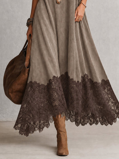 Detail of the taupe dress's flared skirt and dark brown lace hem 14