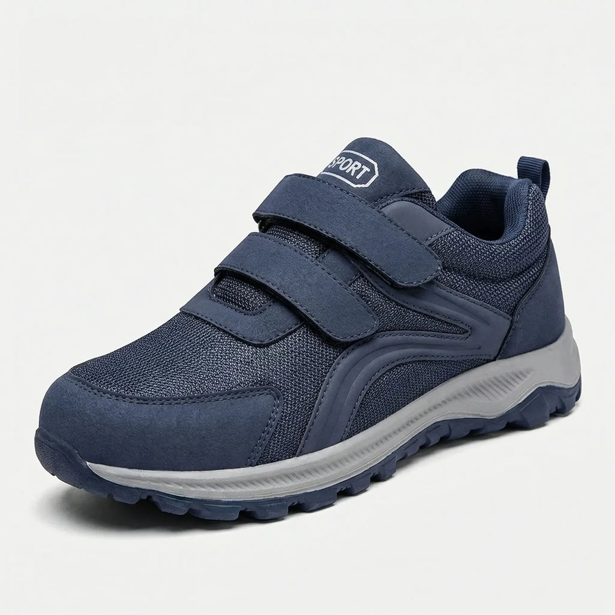 Single navy strap shoe with mesh upper and grey sole, front three-quarter view on white 11