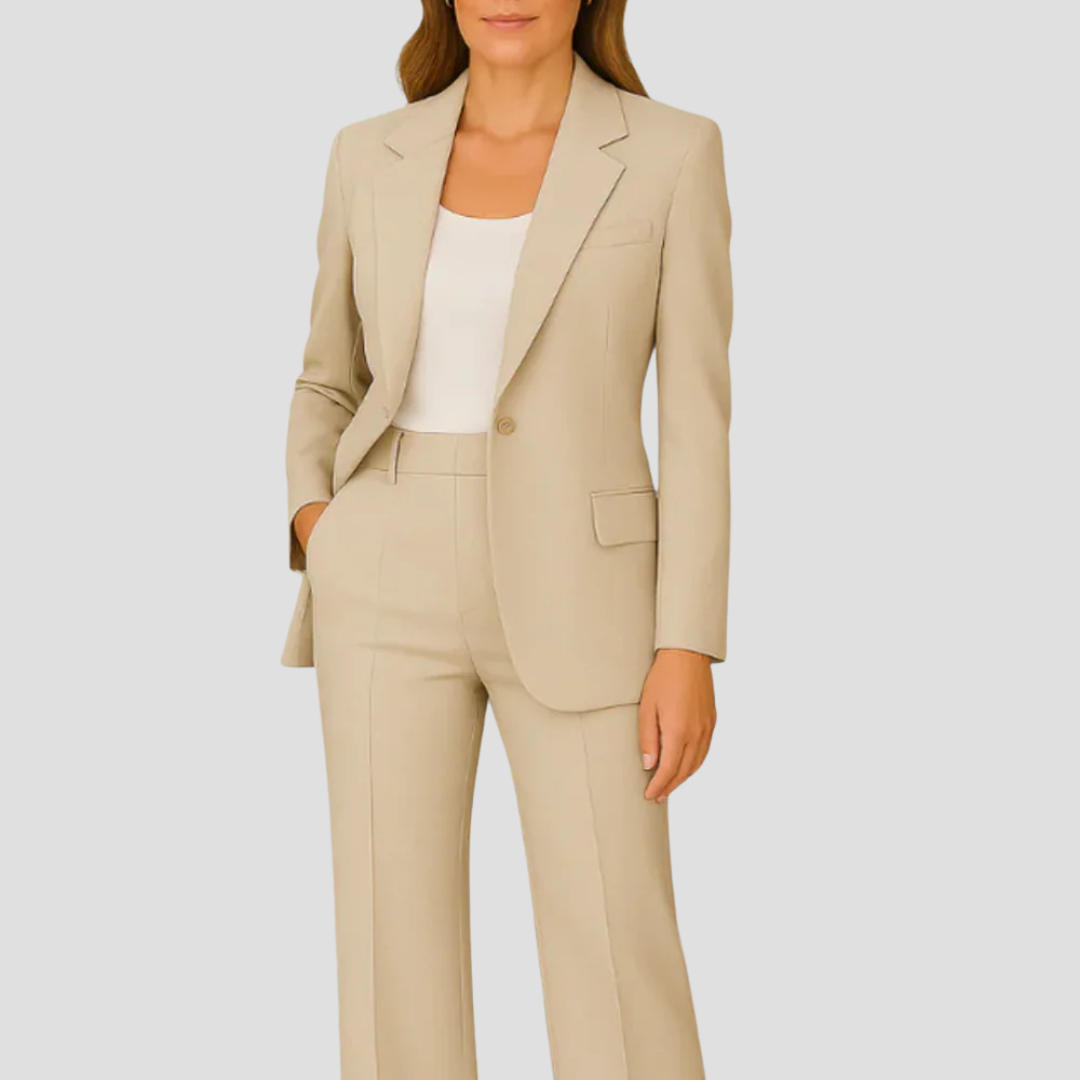 Model wearing the beige suit with a white top and a single matching button 7