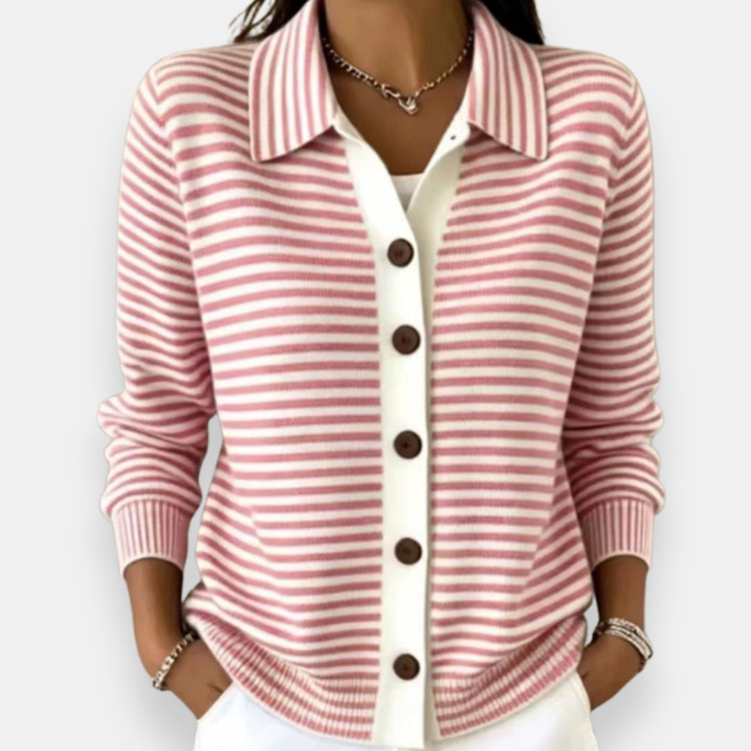 Model wearing the collared cardigan in pink and white stripes, with a white button placket, brown buttons and ribbed cuffs. 4