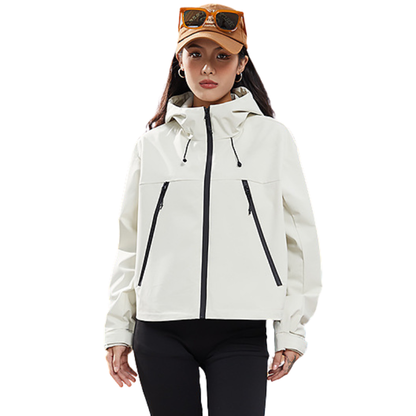 Front view of the cream jacket worn by a woman with sunglasses resting on her cap 4