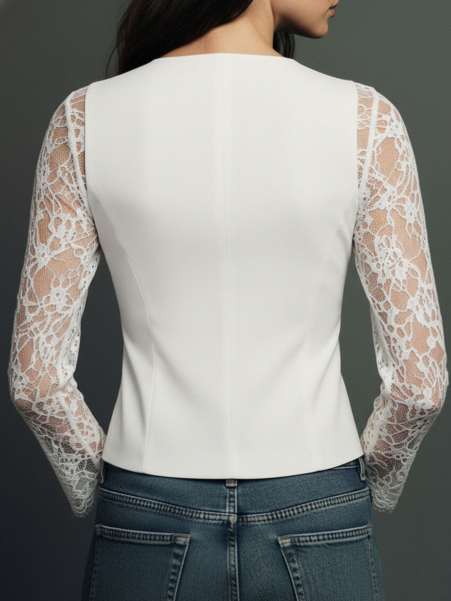 Back view of the white version, showing smooth tailored back panels and sheer white lace sleeves 13