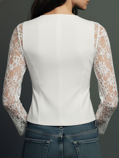 Back view of the white version, showing smooth tailored back panels and sheer white lace sleeves 13