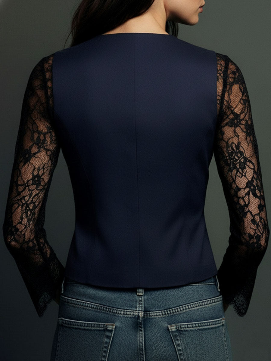 Back view of the navy version, with black sheer lace sleeves and a plain structured back 16