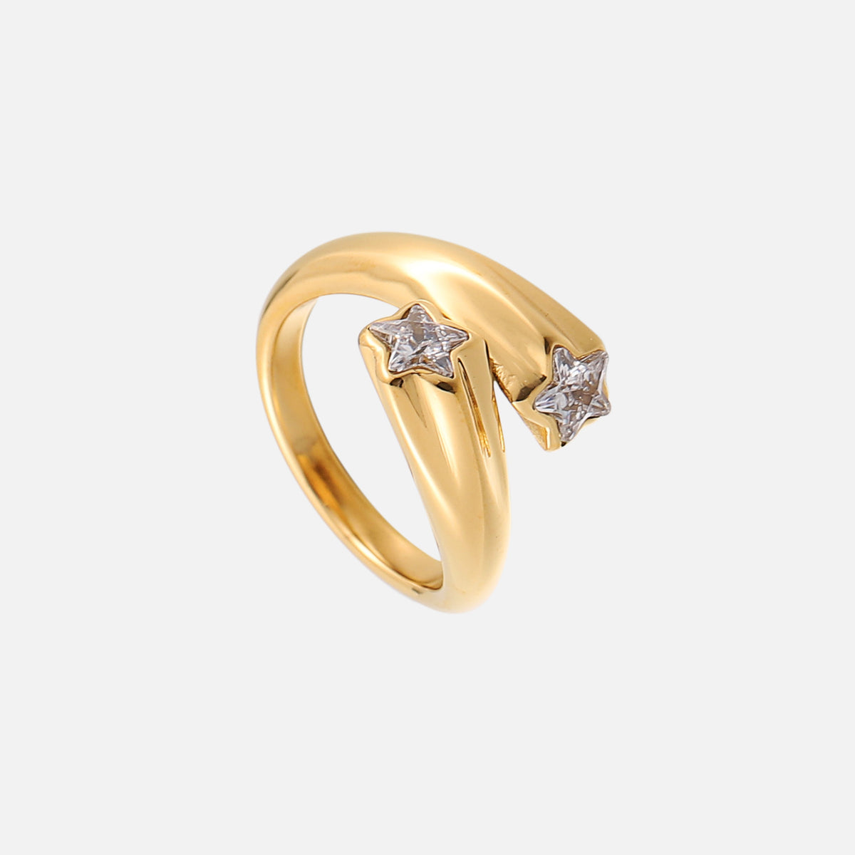 Angled side view of the gold wraparound ring, showing its smooth curved band and the two clear star-shaped stones at the open ends. 2