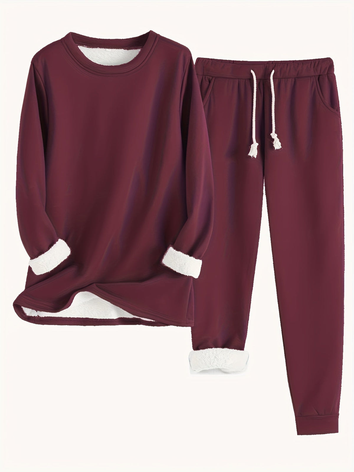 Flat lay of the set in deep burgundy, showing the white fleece lining at cuffs and hem 2