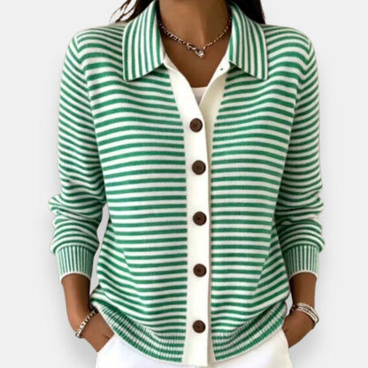 Model wearing the collared cardigan in green and white stripes, with a white button placket, brown buttons and ribbed hem. 2