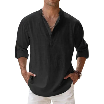 Model wearing the black Henley shirt with a stand collar, short placket and sleeves rolled to the forearm. 7