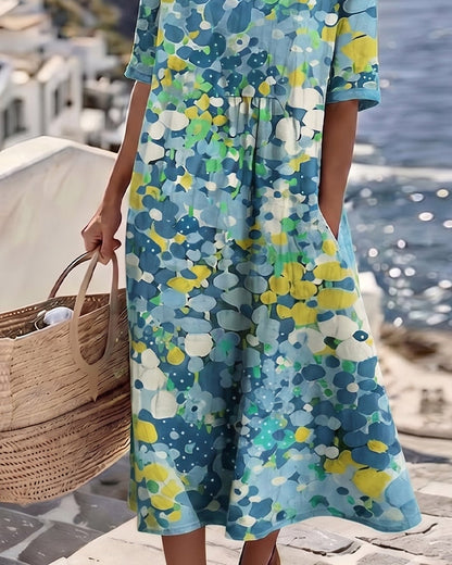 Detail of the blue floral dress's skirt, side pocket and gathered waist, with a woven basket 11
