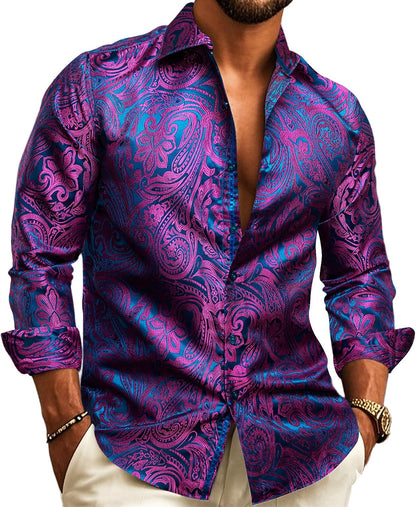 Model wearing the long-sleeve shirt with vivid magenta paisley patterns on a bright blue jacquard base. 14
