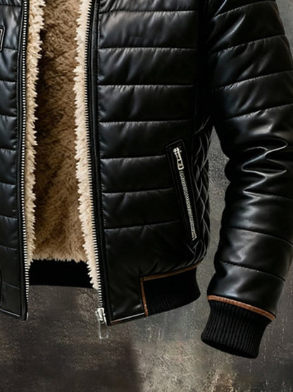Close-up of the lower front showing a zipped side pocket, ribbed hem and cuff with brown trim 6