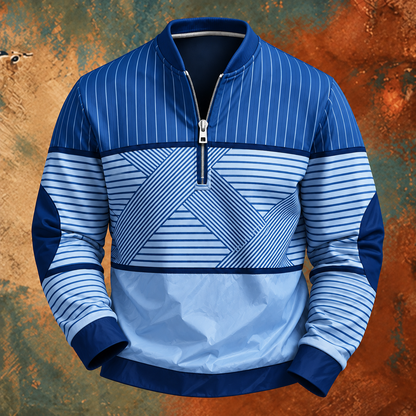 Blue and pale blue version of the striped half-zip jumper, front view on a textured backdrop 4