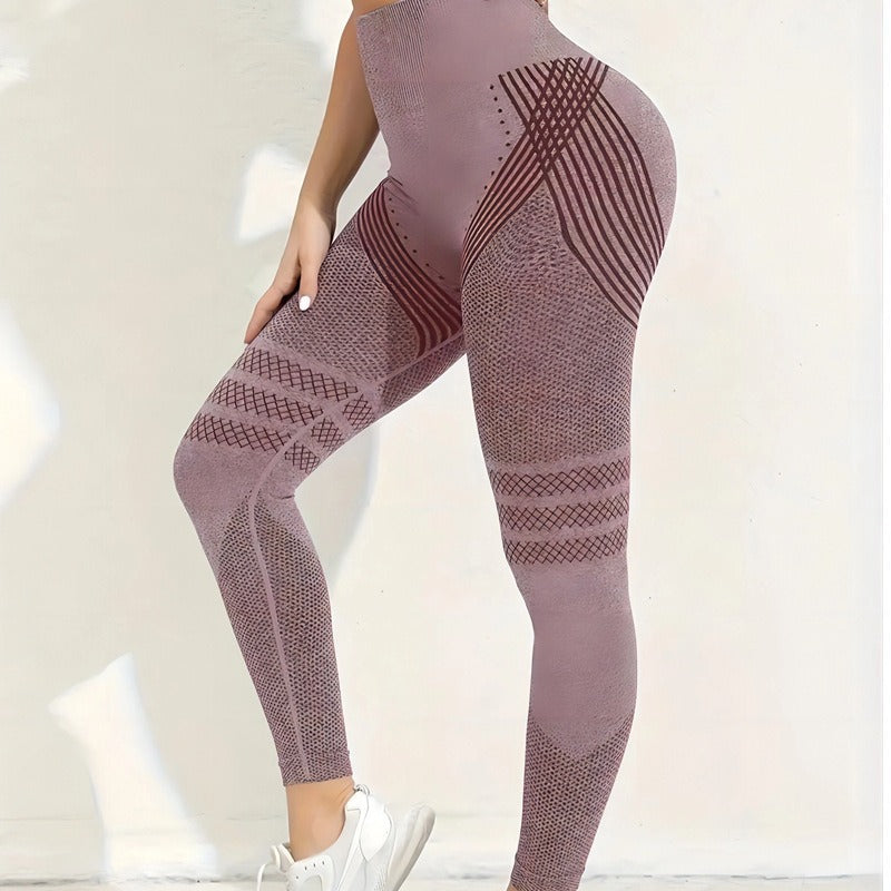 Side view of dusty mauve seamless leggings with dark striped and mesh panels, worn by a model against a white wall. 22