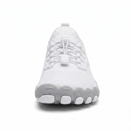 Front view of a white trainer showing the broad rounded toe, toggle laces and separated toe pods on the grey sole. 8