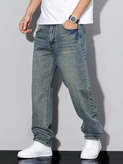 Vintage-style blue jeans with a slightly yellowed wash, worn loose with a white tee and trainers. 10