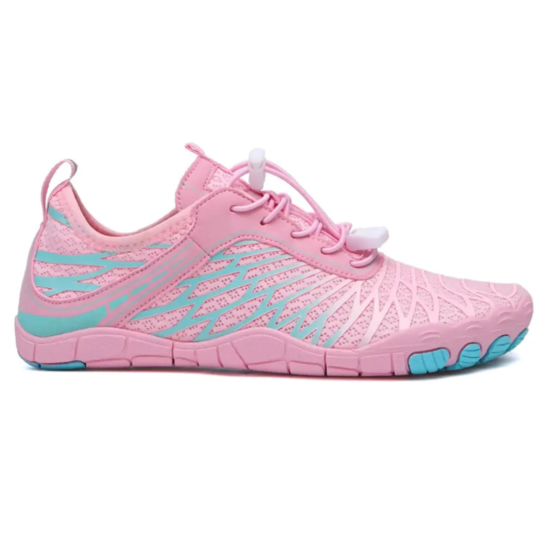 Opposite side view of the pink barefoot shoe, showing turquoise detailing, elastic laces and separated toe pads. 10