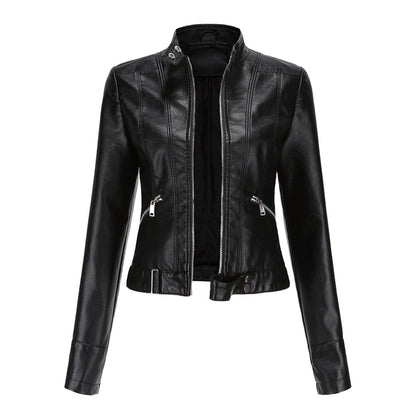 Front view of the black cropped jacket, unzipped, showing stand collar, slanted zip pockets and belted hem with press studs. 2