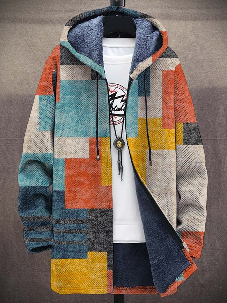 Hooded zip cardigan in a teal, orange, yellow and grey patchwork block print, shown open on a stand 6