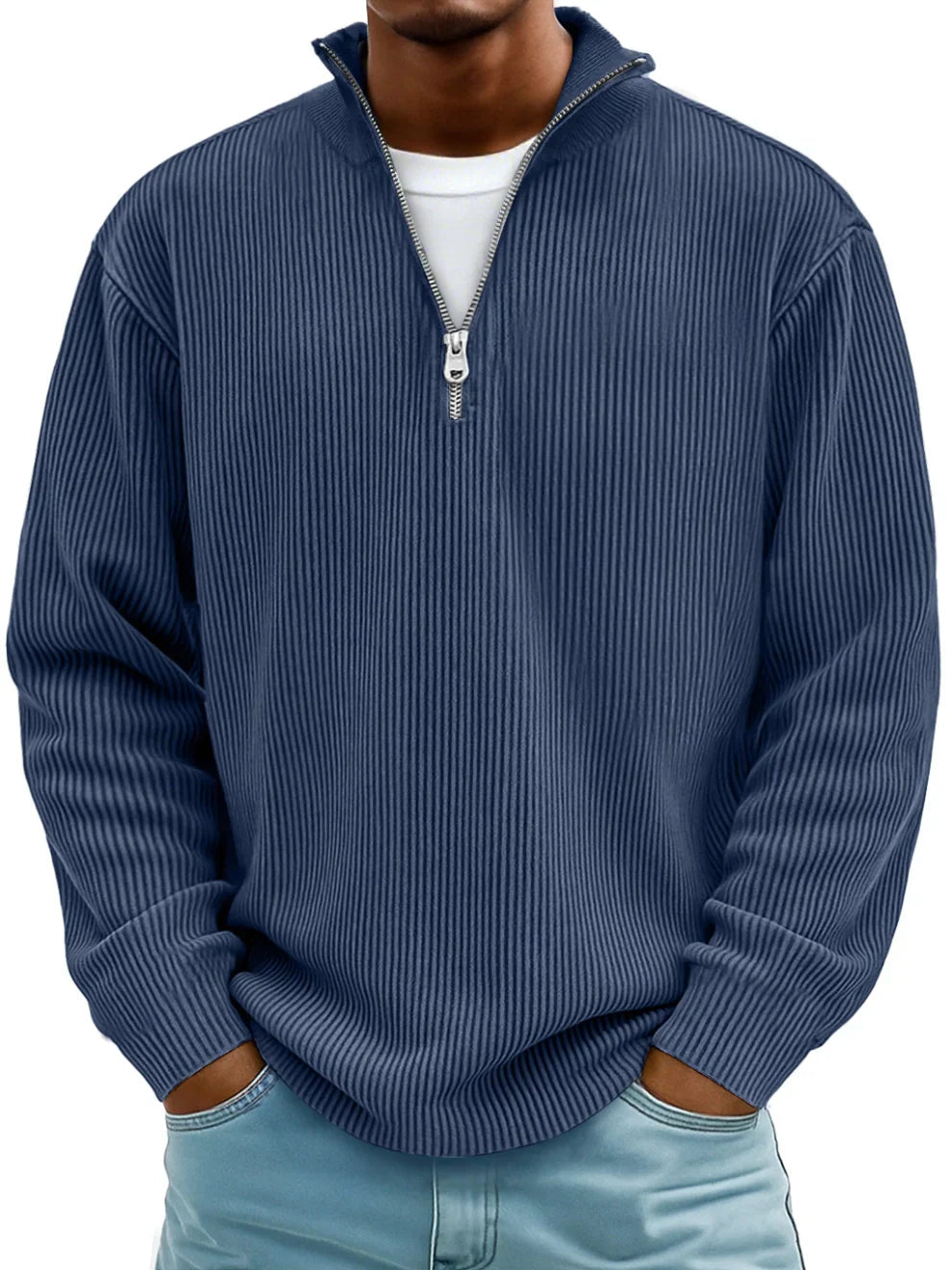 Man wearing the ribbed half-zip jumper in navy blue over a white tee, hands in jeans pockets, front view. 6
