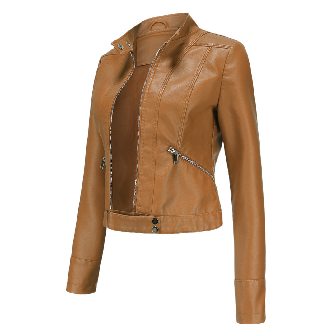 Three-quarter side view of the tan jacket, unzipped, showing collar studs, diagonal zip pocket and snap-fastened hem tab. 12