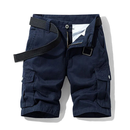 Front view of navy blue cargo shorts with a black webbing belt threaded through the loops and thigh pockets. 2