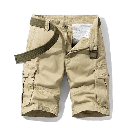 Front view of khaki cargo shorts with an olive green webbing belt, buttoned thigh pockets and a metal ring buckle. 3