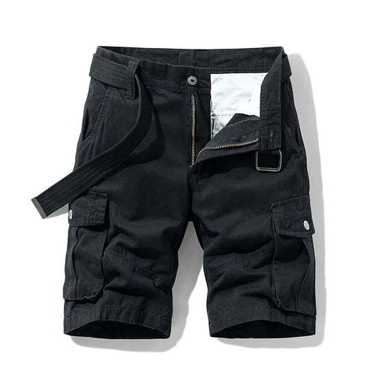 Front view of black cargo shorts with a black webbing belt, unzipped fly and large flap pockets on each thigh. 1