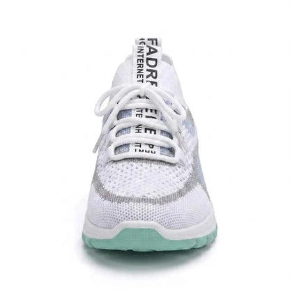 Front view of the white and mint green mesh trainer, showing the rounded toe, laces and printed heel tab. 17