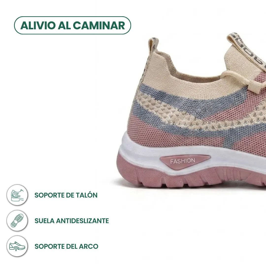 Close-up of the heel of a beige, pink and grey mesh trainer, with icons for heel support, grip and arch support. 31