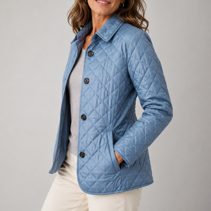 Light blue quilted jacket seen from the side, one hand in the pocket, over grey top 4