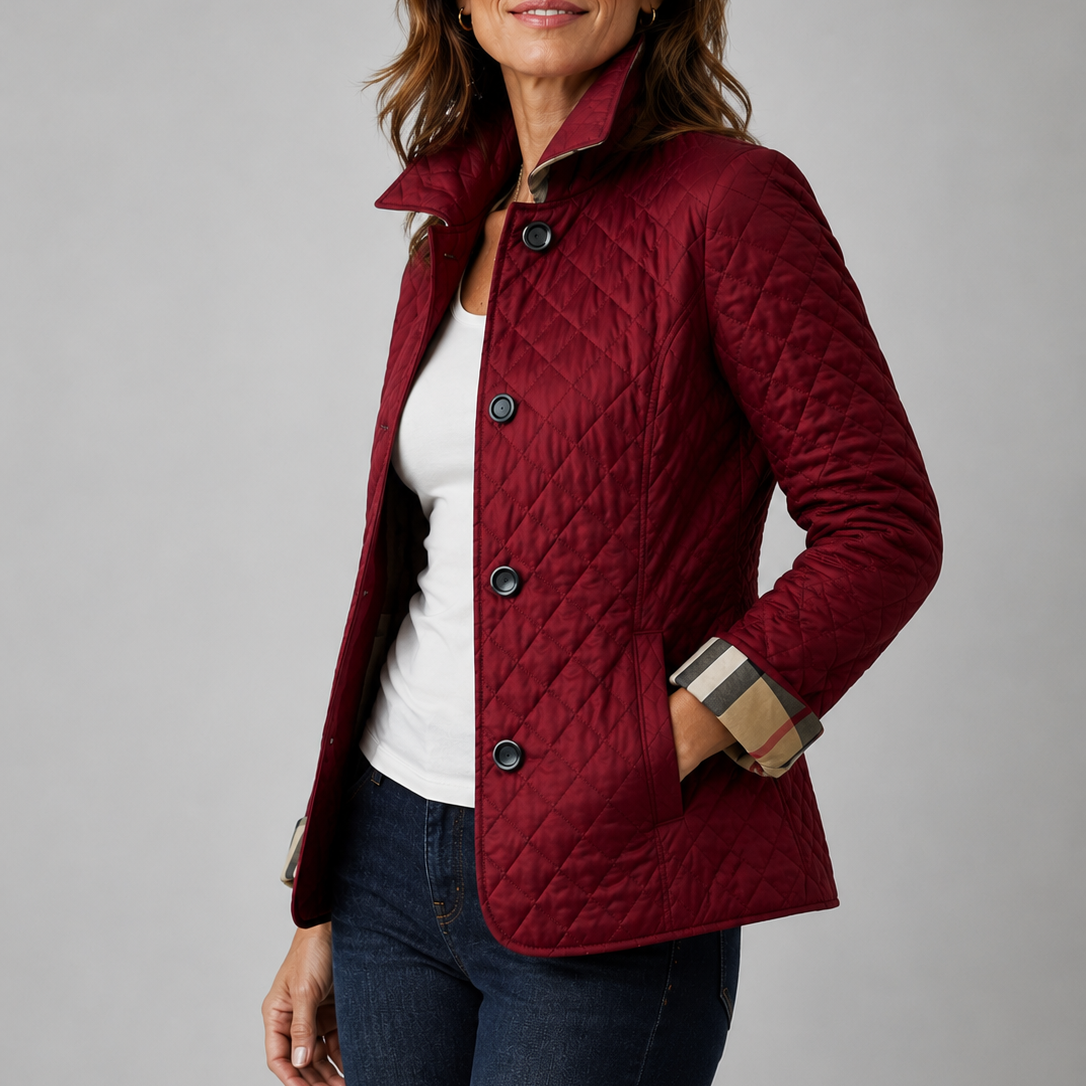 Burgundy quilted jacket worn with a white top and jeans, checked cuff lining showing 5