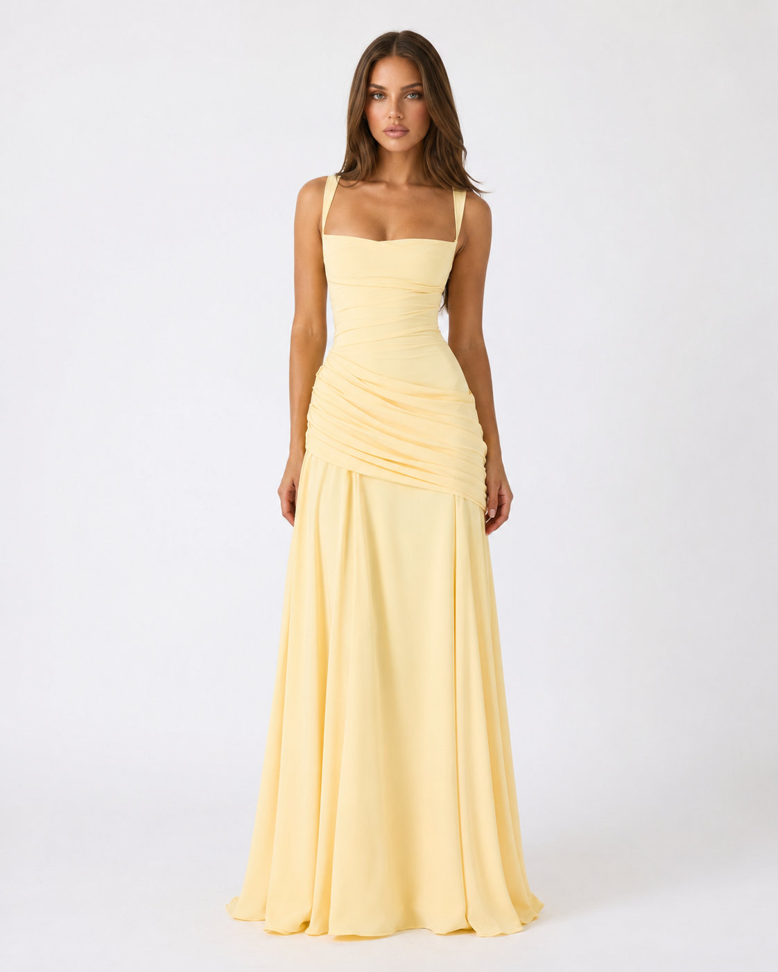 Full-length front view of the pale yellow maxi dress on a model, showing wide straps and diagonal gathered waist. 4
