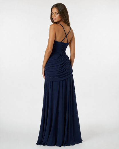 Back view of the navy blue maxi dress, showing the lace-up back and crossed adjustable straps. 8