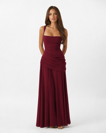 Burgundy maxi dress on a model, front view, with square neckline, ruched waist and flowing skirt 16