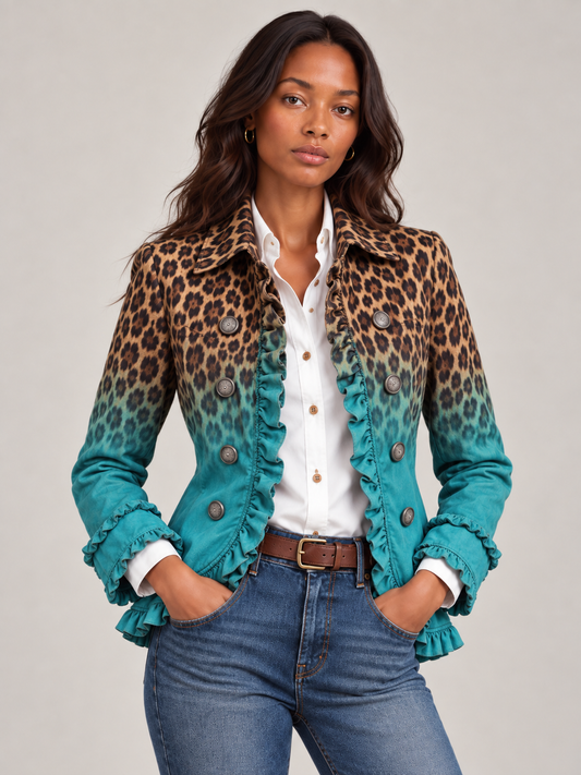 Teal version of the ruffle-trimmed blazer in a close front view, worn open over a white shirt with hands in jeans pockets. 1