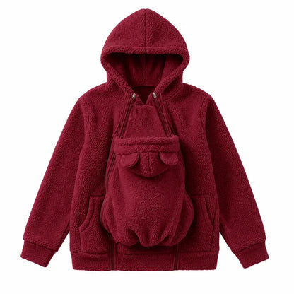 Flat lay of the hoodie in deep burgundy red with the baby carrier panel attached, bear ears on its small hood. 16