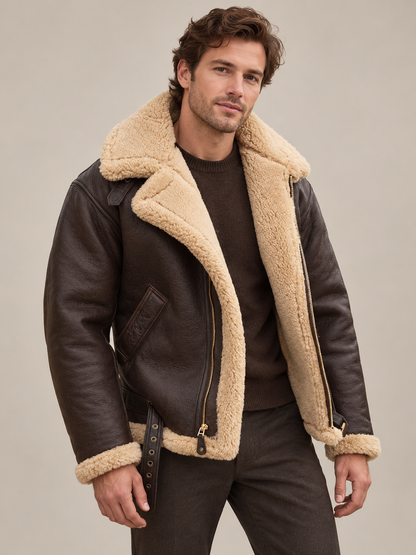 Model in a dark brown leather jacket with cream shearling lining, worn open over a knit jumper 1