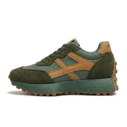 Side view of a green trainer with suede panels, tan side stripes and gum sole 11