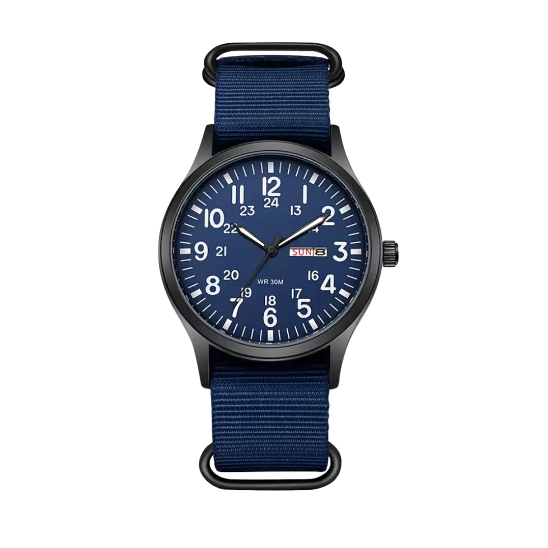 Front view of the version with a navy blue dial, white numerals, day-date window and matching navy woven strap. 6