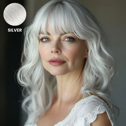 Older model with wavy silver-white hair and a soft fringe, with a colour swatch 10