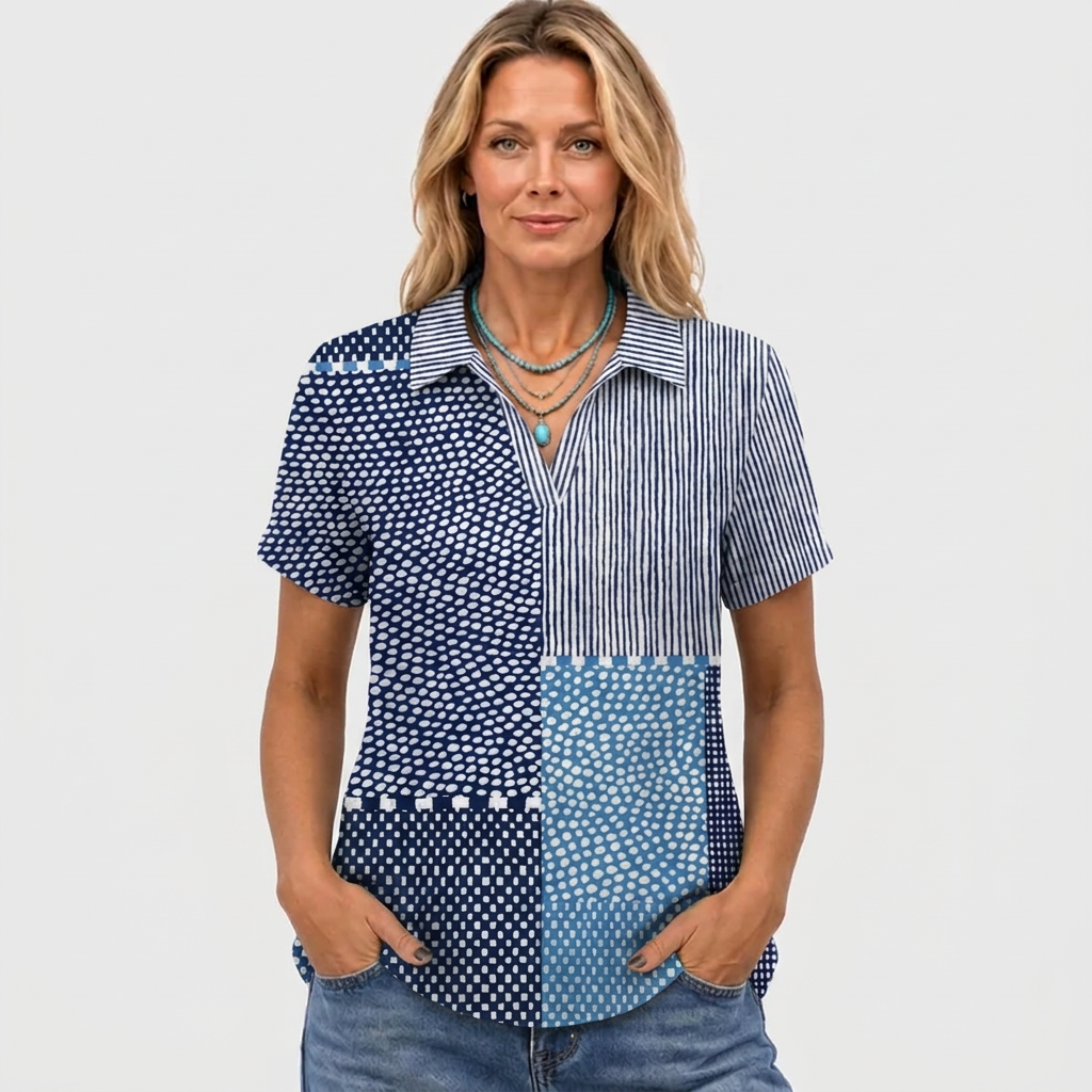 Full front view of a model wearing the shirt with jeans and a turquoise necklace 2