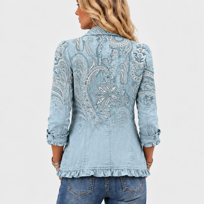Back view of the jacket showing the large paisley print and ruffled hem 5